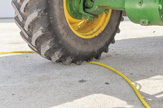 Dramm ColorStormâ„¢ Yellow Hose 5/8"- 100 Ft. Under Tractor Tire