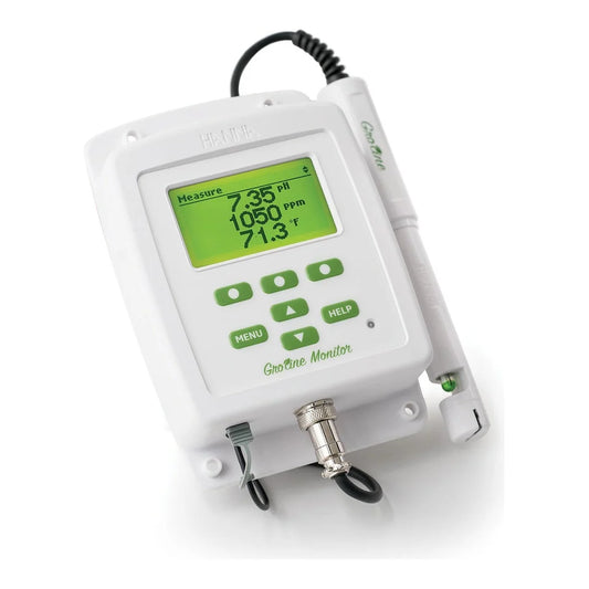 Angled view of the Hanna GroLine HI981420 pH EC TDS monitor with the probe clipped to its housing