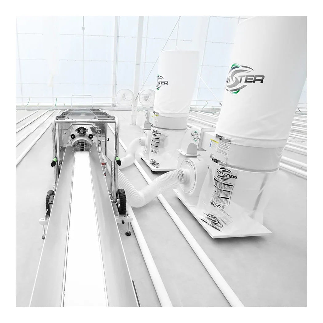 Twister feed conveyor shown in line with trimming equipment