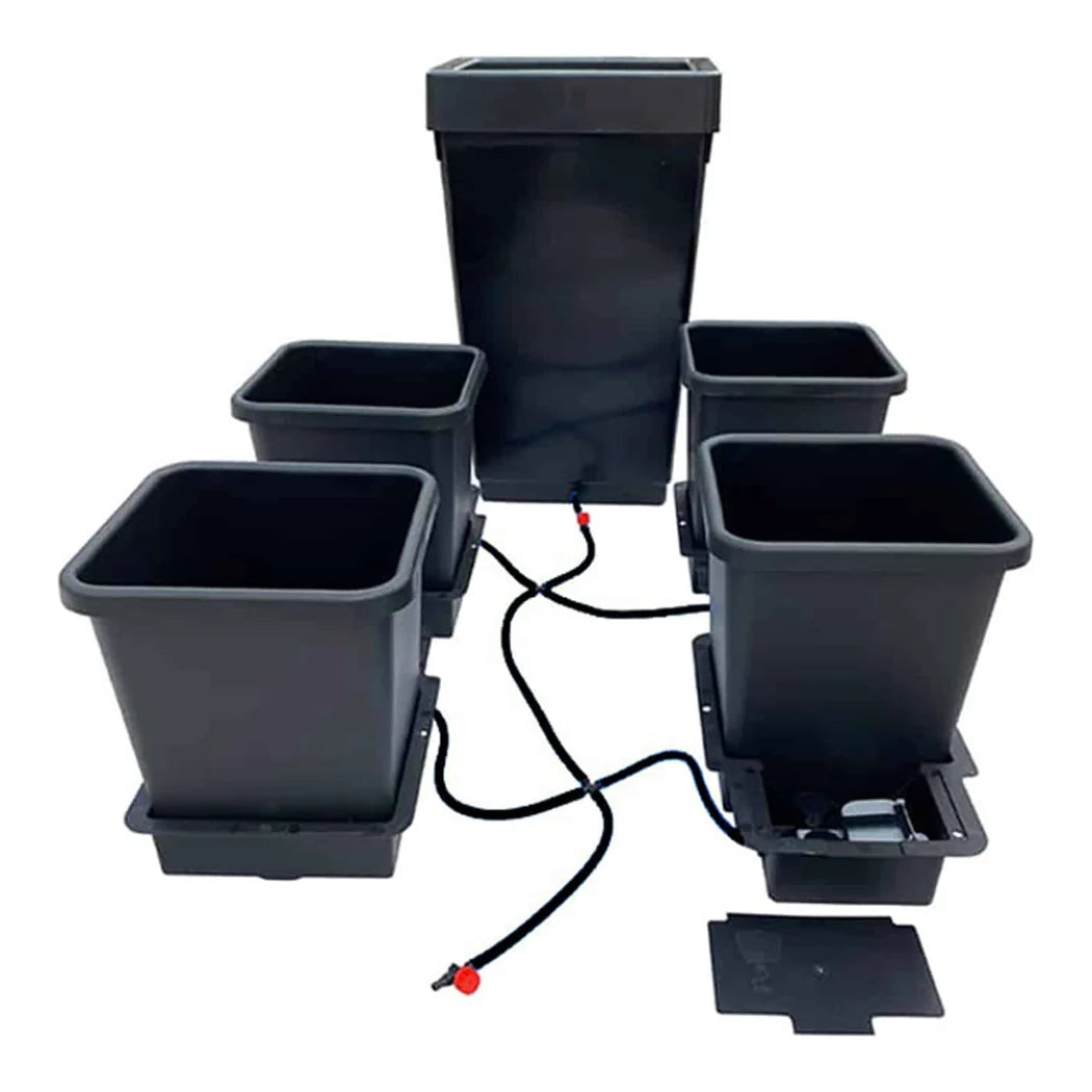AutoPot 4Pot gravity watering system with four black pots, trays and AQUAvalve tubing