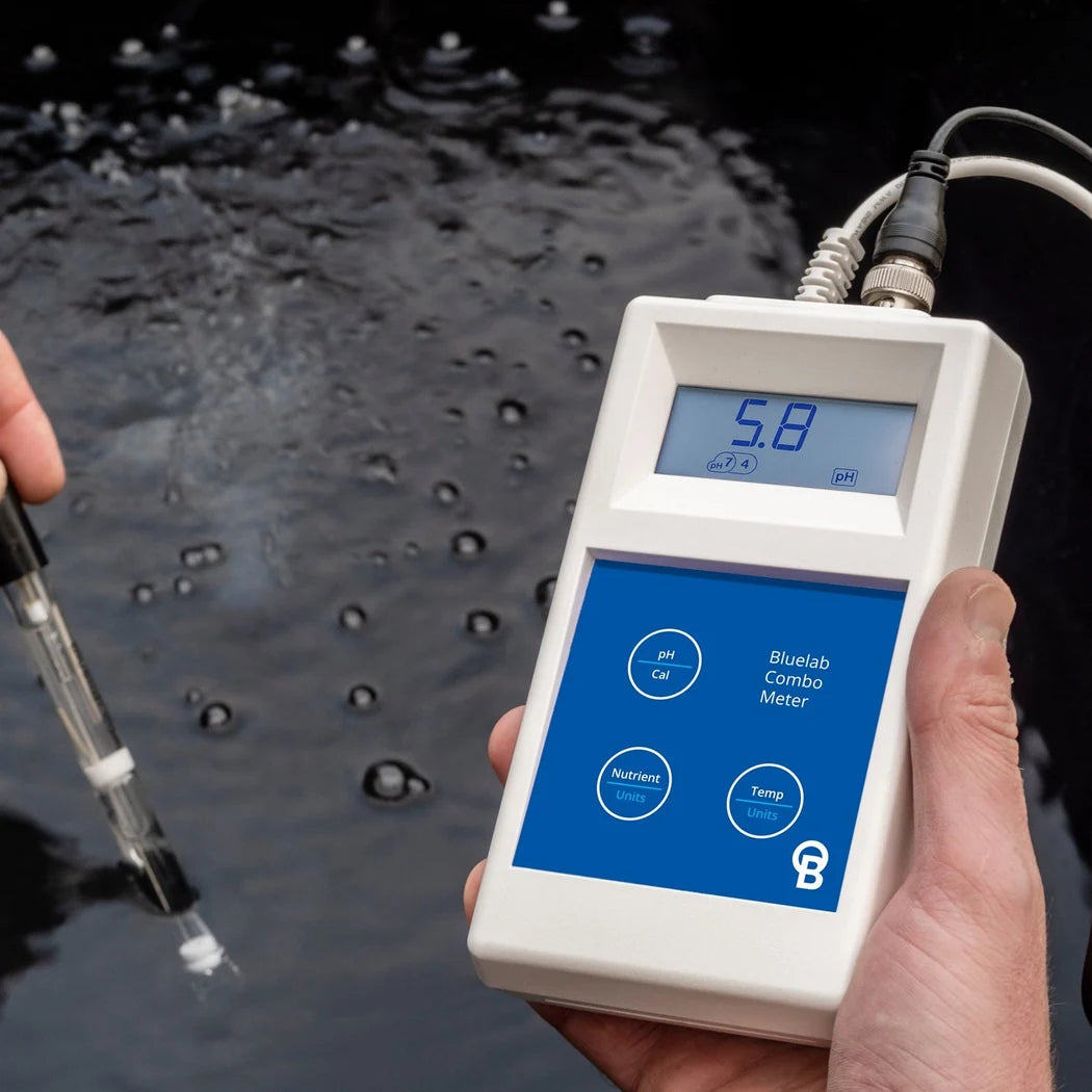 Bluelab Combo Meter measuring pH in a nutrient reservoir with the replaceable Bluelab pH probe