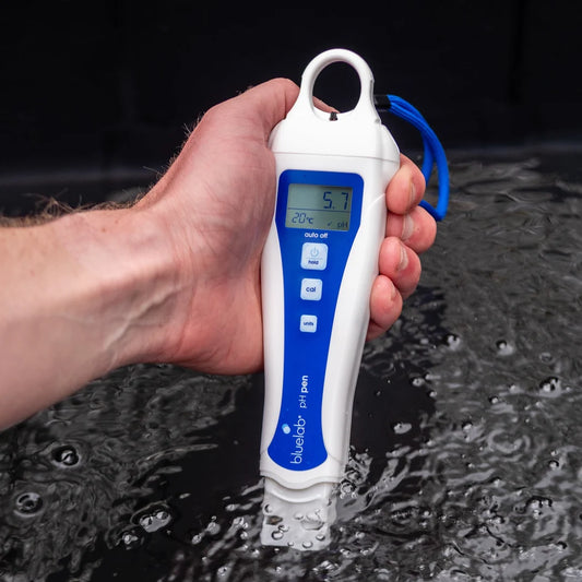 Bluelab pH Pen being used to take a pH reading in a nutrient reservoir