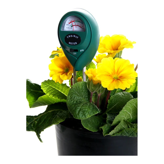 Active Air 2-way pH and moisture meter probe in a potted plant, dial showing dry-moist and pH scales