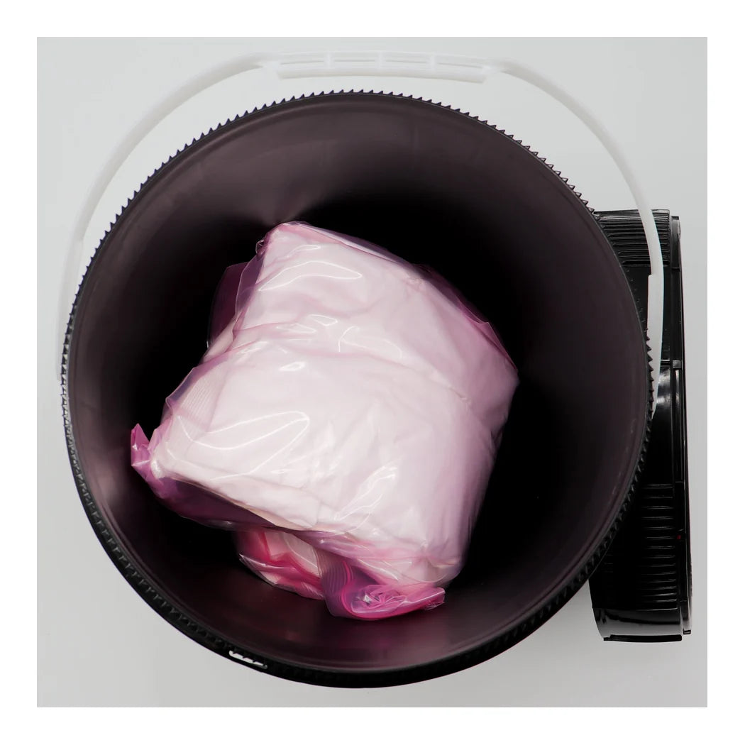 Integra Dry Bucket opened showing the 600g desiccant pouch inside