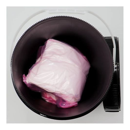 Integra Dry Bucket opened showing the 600g desiccant pouch inside
