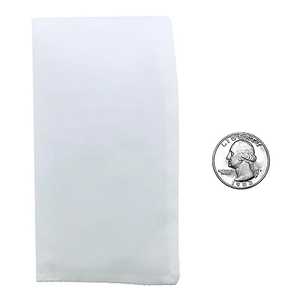 Press Club 3 x 6 rosin bag next to a quarter for scale