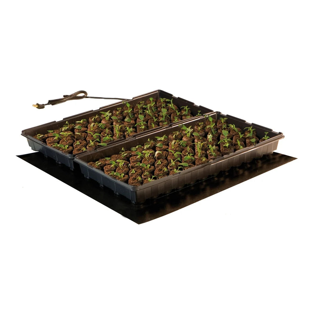 Seedling heat mat in use under a planted 1020 tray